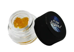 Container of cannabis concentrate, indicating the concentrates category known for minimal dose and maximum effects.