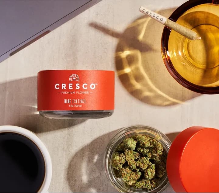 Cresco Premium Flower jar with coffee and cannabis buds